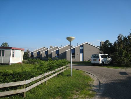 Bungalows at our holiday park. We stayed in a couple of dozen of these. Photo of bungalows.