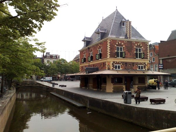 The weighing-house with its adjacent canal. The marketplace was farther on. The weighing-house.